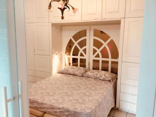 Ein Bett oder Betten in einem Zimmer der Unterkunft Villa Maria Callas Sirmione