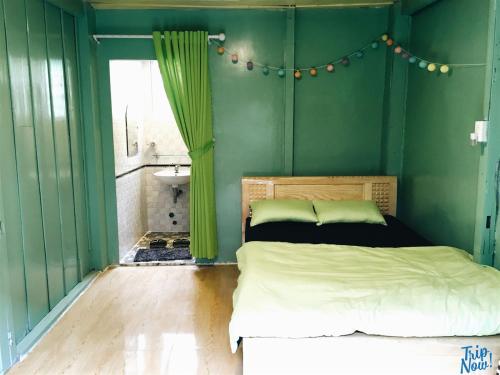 Postel nebo postele na pokoji v ubytování Homestay Hoang Vy
