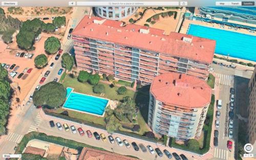 an aerial view of a large building in a city at The Hollidays Apartment in Calella