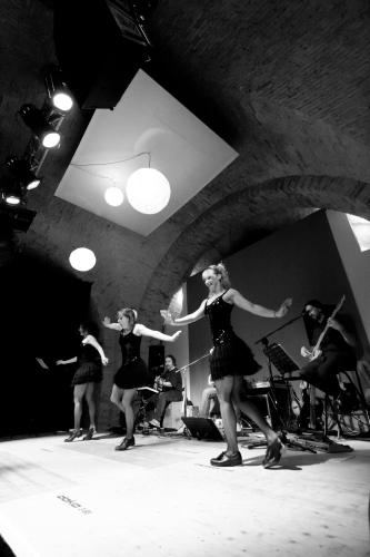 a group of young women dancing on a stage at Masseria Sant'Agapito in Lucera