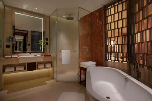 A bathroom at Hyatt Regency Qingdao - Stone old beach - Exhibition Center