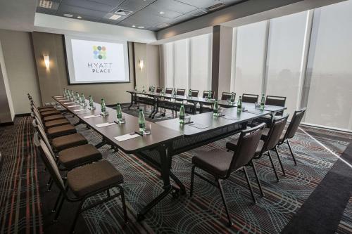 a large conference room with a long table and chairs at Hyatt Place Santiago/Vitacura in Santiago