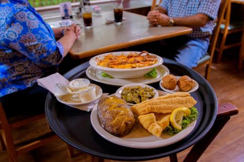 a tray with plates of food on a table at Carter Caves State Resort Park in Olive Hill