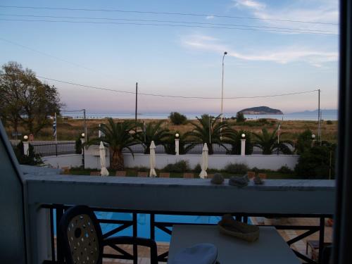 a view from the balcony of a house at Kavala Beach Hotel apartments in Iraklitsa