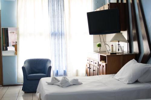 Postel nebo postele na pokoji v ubytování Hotel Valerie