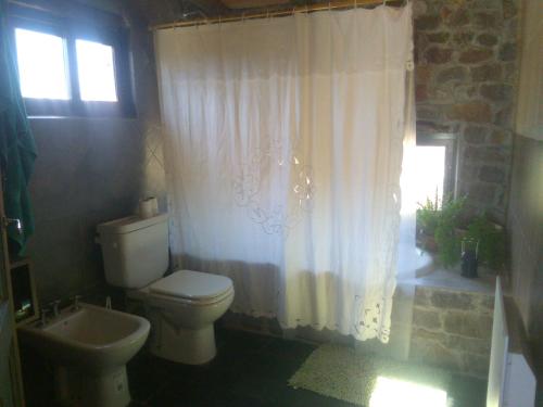Vonios kambarys apgyvendinimo įstaigoje Hogar de Campo