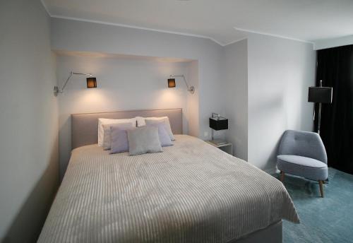 Posteľ alebo postele v izbe v ubytovaní Apartament Mozart