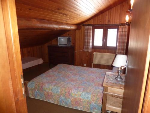 Postel nebo postele na pokoji v ubytování Chalet Le Starfu