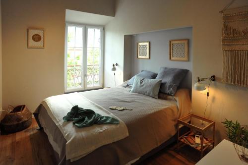 Katil atau katil-katil dalam bilik di Belle Cinque Terre Apartments