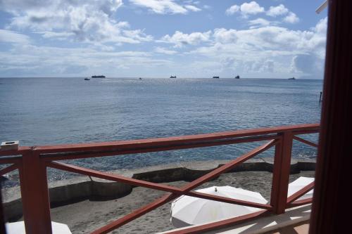 a view of the ocean from a boat at The Old Gin House in Oranjestad