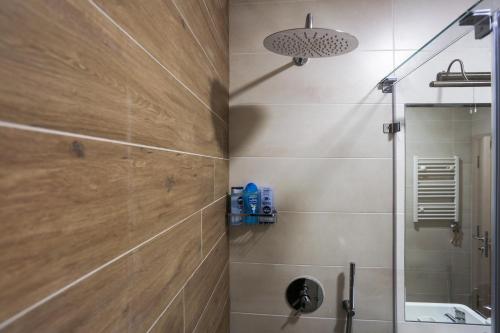 a bathroom with a shower and a sink at Apartment Promenada in Novi Sad