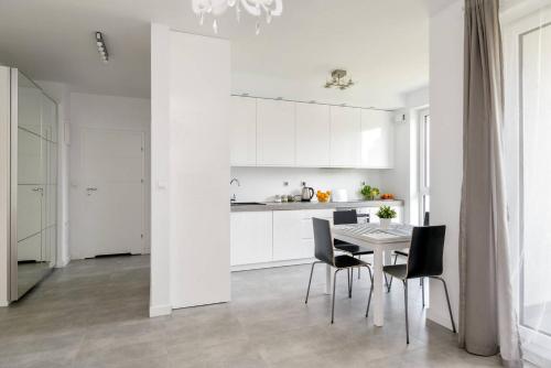 Η κουζίνα ή μικρή κουζίνα στο Good Time Apartments Kościelna 17 19