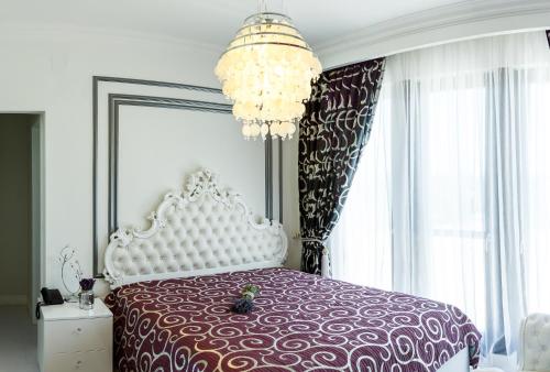 Katil atau katil-katil dalam bilik di Pensiunea Primaverii