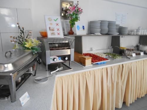 Una cocina o zona de cocina en Hotel Koala