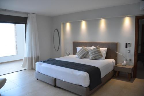 Ein Bett oder Betten in einem Zimmer der Unterkunft Villa LouLa