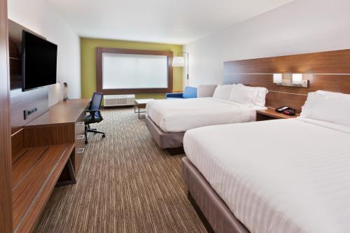 Postel nebo postele na pokoji v ubytování Holiday Inn Express & Suites - Cartersville by IHG