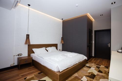 Katil atau katil-katil dalam bilik di Eleven Hotel and Hall