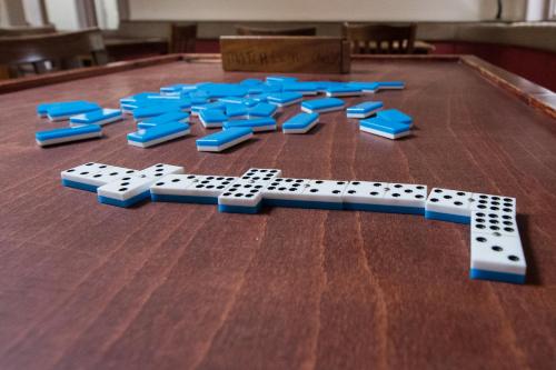 a group of blue controllers sitting on top of a table at The Rodney in Warrington