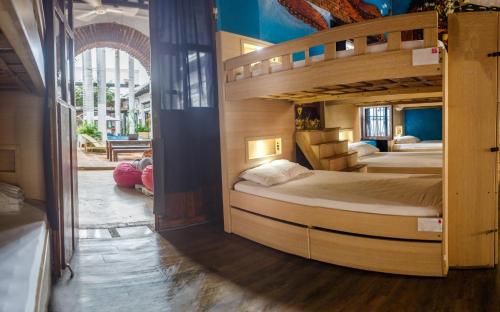 Katil atau katil-katil dalam bilik di Villana's Hostal Santa Marta