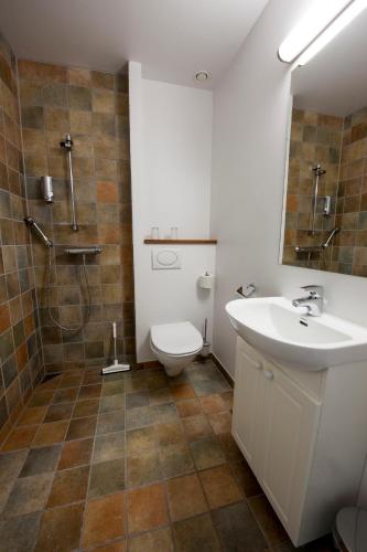 Koupelna v ubytování Gjaargardur Guesthouse Gjogv