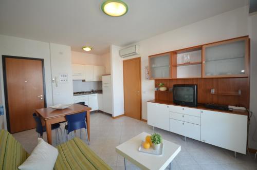 Кухня или кухненски бокс в Appartamenti Torre Del Sole
