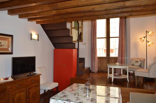 TV a/nebo společenská místnost v ubytování Apartamentos Nuncio Viejo