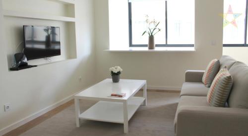 TV a/nebo společenská místnost v ubytování Apartments VMadeira