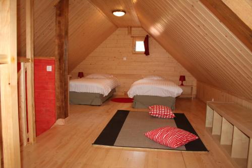 Кровать или кровати в номере Le Hameau des Grilles