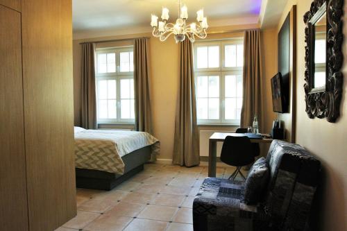 Ein Bett oder Betten in einem Zimmer der Unterkunft Adelhoff