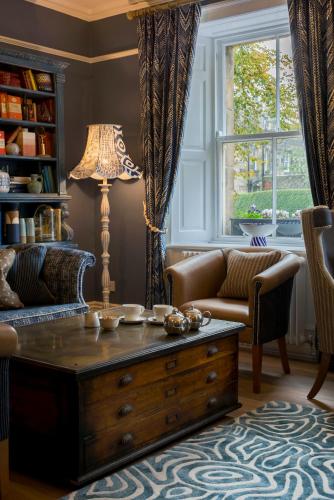 a living room with a coffee table and a couch at The Cookie Jar in Alnwick