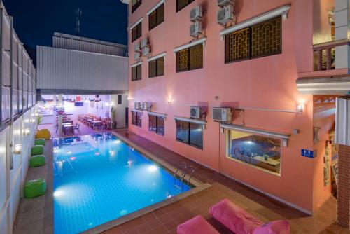 an overhead view of a swimming pool in a building at The Siem Reap Chilled Backpacker in Siem Reap