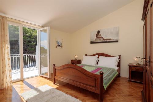 Posteľ alebo postele v izbe v ubytovaní Apartments and Room Alen