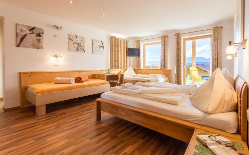 Postel nebo postele na pokoji v ubytování Apartments Harreiter