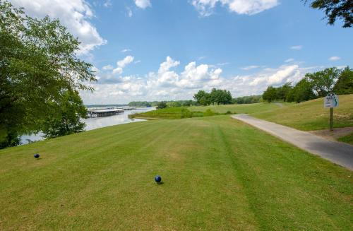 a golf course with a view of a river at Barren River Lake State Resort Park in Lucas