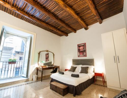 En eller flere senge i et værelse på DUOMO 22