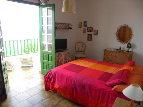 Postel nebo postele na pokoji v ubytování Apartamento en piscinas naturales.