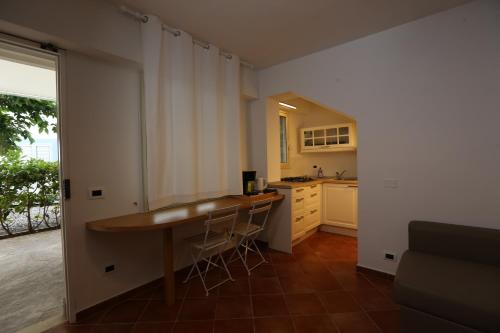 Kuchyň nebo kuchyňský kout v ubytování Ancora Bianca Beach Residence