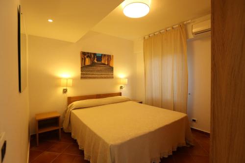 Postel nebo postele na pokoji v ubytování Ancora Bianca Beach Residence