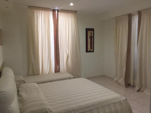 Ένα ή περισσότερα κρεβάτια σε δωμάτιο στο Villa Accini