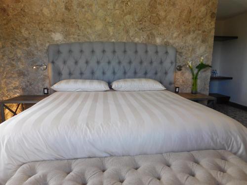 Cama o camas de una habitación en Cabañas Rancho San Jorge