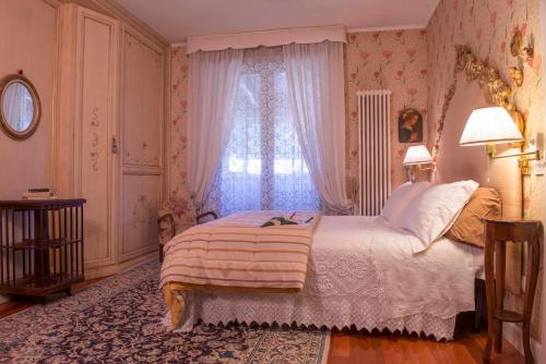 Ein Bett oder Betten in einem Zimmer der Unterkunft Residenza Eda