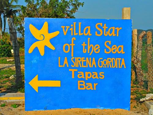 a sign for a wildlife star of the sea la sirma corrientza at Villa Star of the Sea in Barra de Navidad
