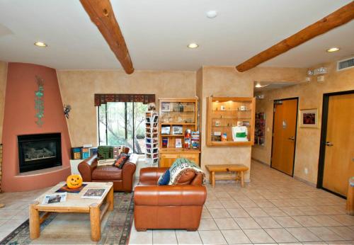 a living room with a couch and a table at Southwest Inn at Sedona in Sedona