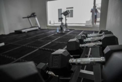 a gym with a row of exercise bikes on the floor at Sea View Luxury Apartment, Fully Furnished, 2 Bedrooms, 2 Bathrooms in Mount Lavinia