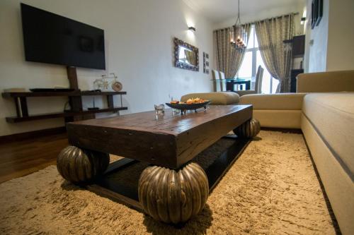a living room with a couch and a coffee table at Sea View Luxury Apartment, Fully Furnished, 2 Bedrooms, 2 Bathrooms in Mount Lavinia