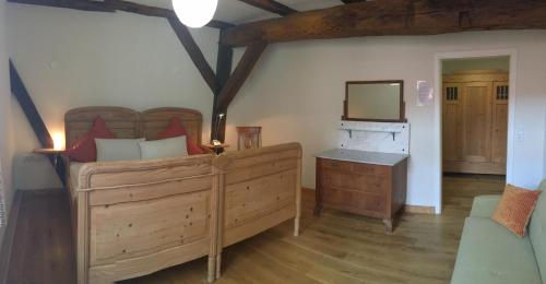 Postel nebo postele na pokoji v ubytování Fachwerk-Hotel Eisenbart