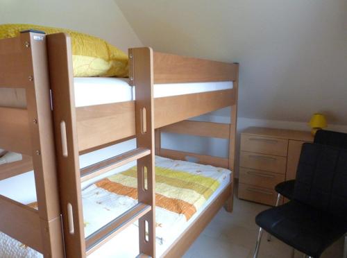 Postel nebo postele na pokoji v ubytování sehr schoene Ferienwohnung in Pose