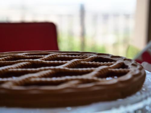 a chocolate cake sitting on top of a table at B&B Vento di Scirocco in Favara