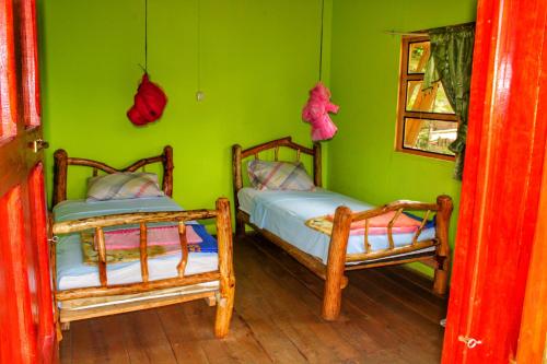 Ένα ή περισσότερα κρεβάτια σε δωμάτιο στο Vista Verde Lodge