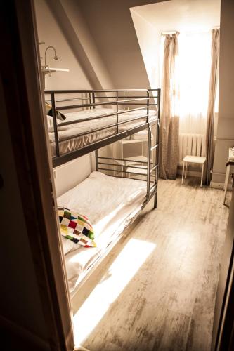 Кровать или кровати в номере Za Murami Hostel